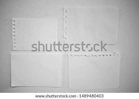 Set of note paper, copybook, notebook sheet stuck on old background