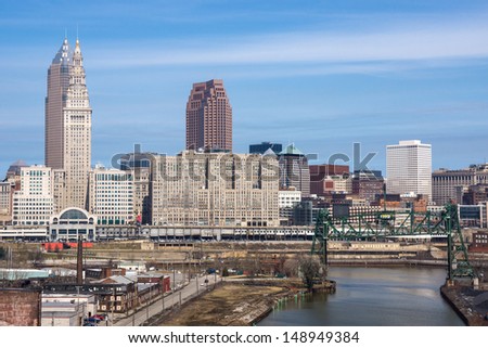 The heart of the downtown Cleveland, Ohio business district as viewed from the Hope Memorial Bridge on the near west side of town including the major tall buildings and the Cuyahoga River