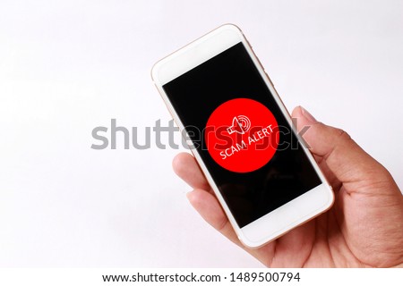 Scam Alert concept on smartphone screen Royalty-Free Stock Photo #1489500794