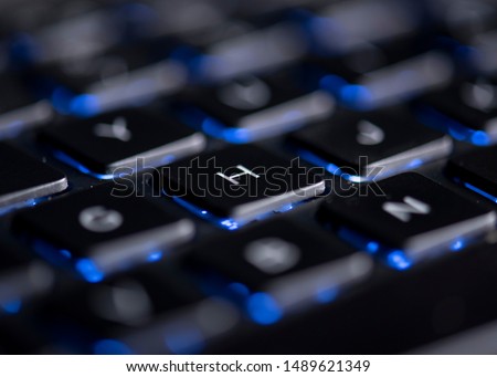 keyboard with back lighting. close-up. Back lit keyboard. Computer technology concept