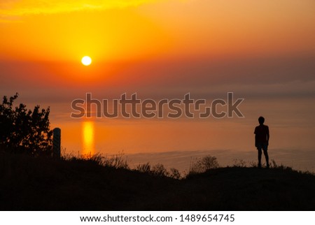 Boy looking on sunset at sea nature people born Crimea landscape