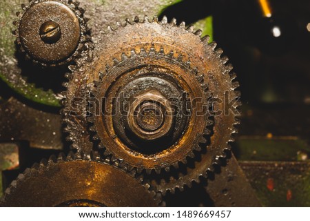 Gears of industrial machine. detail of mechanism. old cogwheels. mechanical parts of machinery