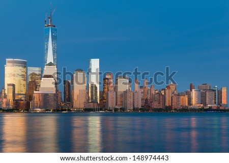 Scenic view of night Manhattan from Hudson river