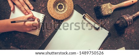 Labor day. Flat top view of building tools, composition on dark background banner for America holiday. Labor day.