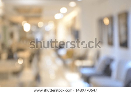 Perspective of art gallery with bokeh lights blur background,interior design.