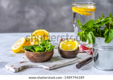 Photo of fresh cool lemon mint water. Infused water. Cocktail. Detox drink. Health care. Fitness. Summer drink. Still life photography. Image
