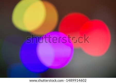 A group of colorful lights blurred as bokeh creates artistic beauty as well.