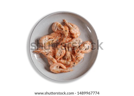 Boiled fresh shrimp on a plate isolated on white background
