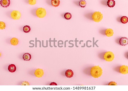 Autumn creative flowers composition. Colorful flowers on pastel pink background. Fall concept. Autumn background. Flat lay, top view, copy space