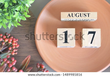 August month design with flower and earthenware, 17.