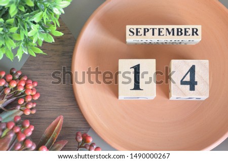 September month design with flower and earthenware, 14.