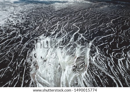 Rugged and Alien Landscape of an Icelandic River Delta During the Winter