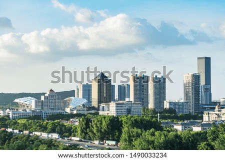 Urban Architecture under Blue Sky and White Cloud