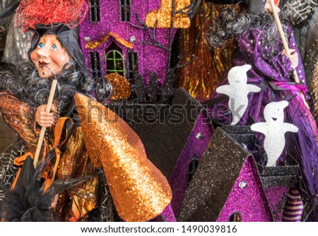 Cute Halloween Witch with a Broom and Ghosts