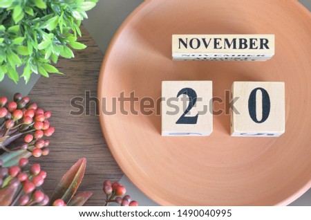 November month design with flower and earthenware, 20.