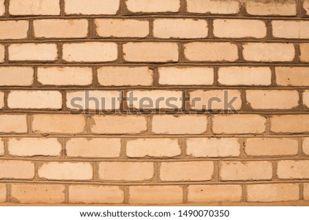 background with free space. texture of an old rough brick wall. smooth rows of light brick. stone fence made of bricks. urban vintage hipster scandy background (backdrop, surface) for graphic design.