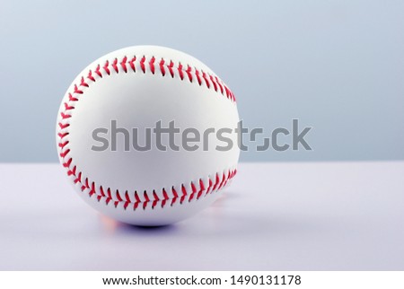 A professional baseball isolated on white.