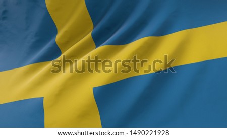 Swedish flag waving in the wind.