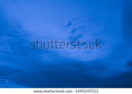 Blue colored sky and clouds. Background and texture