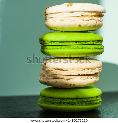 colorful macaroon green and white on a bright background