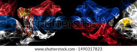 Serbia, Serbian, Philippines, Philippine smoky mystical flags placed side by side. Thick colored silky smokes flag concept