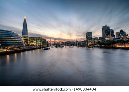 View to the illuminated skyline of London, United Kingdom, after sunset time