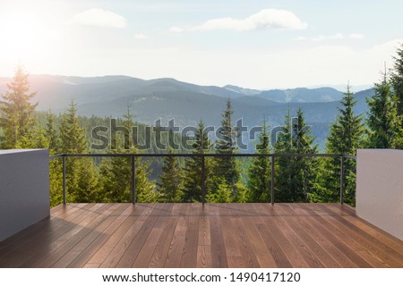 Balcony view of  mountains. Landscape. Sunny Day. Terrace with a beautiful view. Background with beautiful landscape. Royalty-Free Stock Photo #1490417120