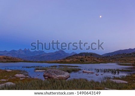 Blue hour on the Aiguilles d'Arves peaks over the Guichard Lake