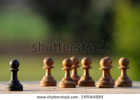 Chess pawns representing confrontation Royalty-Free Stock Photo #149064884
