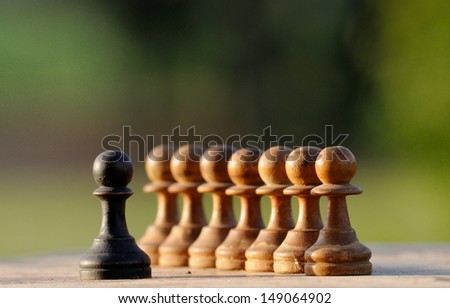 Chess pawns representing confrontation Royalty-Free Stock Photo #149064902