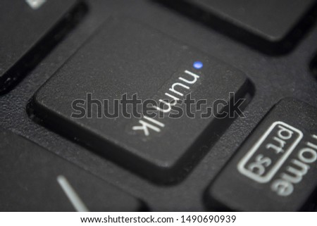 Extreme macro of the num lock key turned on on a laptop keyboard