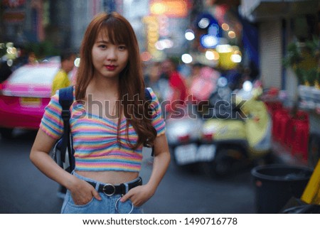 Photos of beautiful Asian women on the roadside in Thailand
