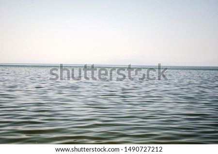 Open lake and waves of water