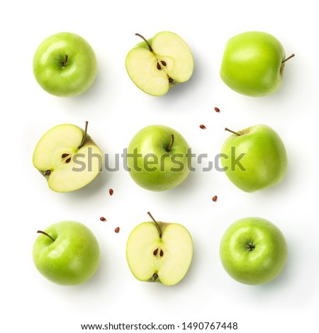 Fresh green apples with seeds isolated on white background. Fruits pattern, top view, flat lay Royalty-Free Stock Photo #1490767448