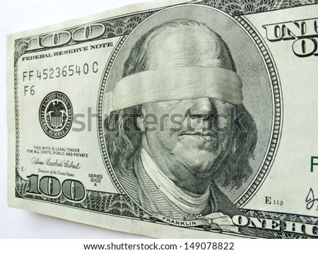 This photo illustration of Ben Franklin wearing a blindfold on a hundred dollar bill might illustrate a misguided economy, leadership issues, inflation, economic recession, or budget cuts etc. Royalty-Free Stock Photo #149078822