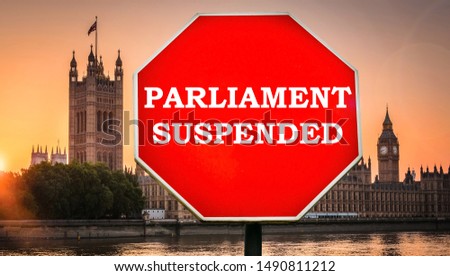 Parliament suspended digital composite with Houses of Parliament, London in background. Government set to prorogue parliament in September with UK set to leave the EU on Oct 31st, 2019 Royalty-Free Stock Photo #1490811212