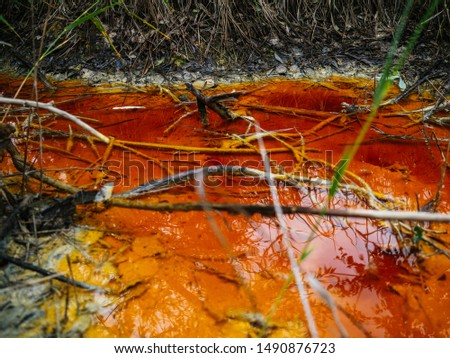 The water in the river is red because of the deposits of clay. A place called Ural Mars. Natural phenomenon