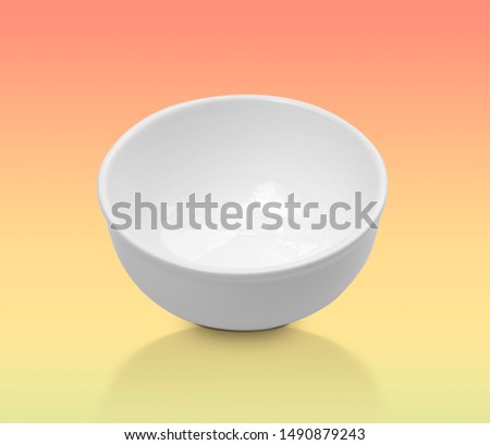 White bowl on gradient pastel background. Side view of ceramic object .