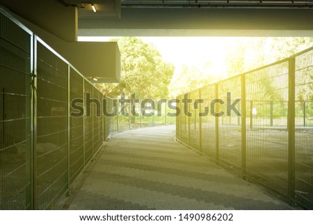 Bridge under the fence, evening light
