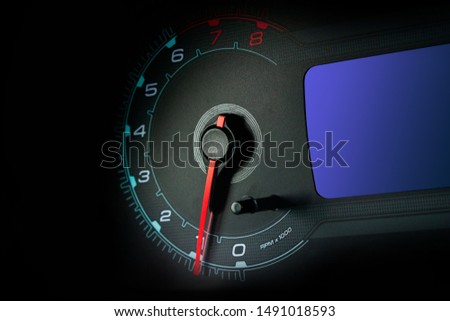 Tachometer and car speedometer closeup. Car dashboard.