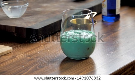 
extreme blue homemade cocktail for friends