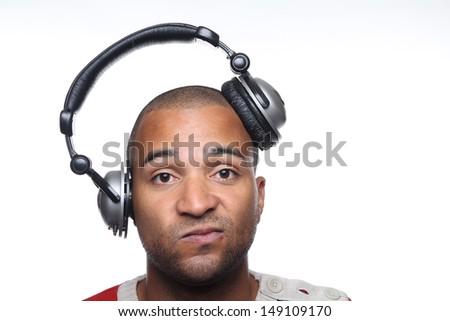 Happy man with a headphone loves music