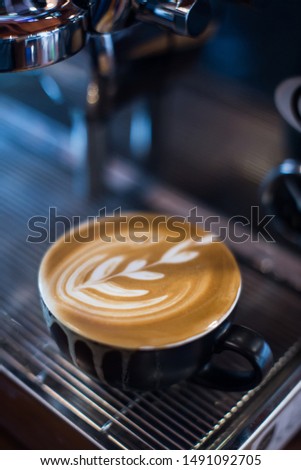 Coffee latte on espresso machine Royalty-Free Stock Photo #1491092705