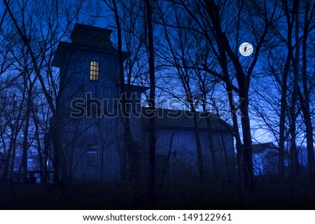 This dark, scary Haunted Mansion would make a great Halloween background illustration with its large moon and owl.