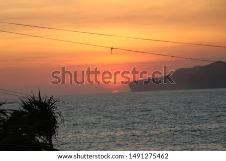 Beautiful sunset on the beach of Yogyakarta