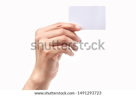 Man hand holding a blank card isolated on a white background Royalty-Free Stock Photo #1491293723