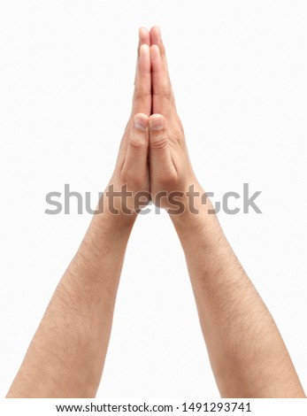 Cropped shot of an unrecognizable man hands in praying gesture isolated on a white background
