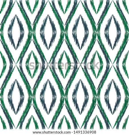 Ikat ogee seamless vector pattern design. Ethnic fabric print geometric ikat pattern. Modern ogee seamless repeating background. Tribal motifs ikat textile print design. Pillow ornament.