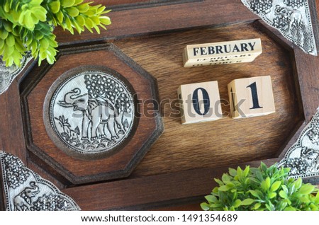 February month with elephant silver wooden design, Date 1.