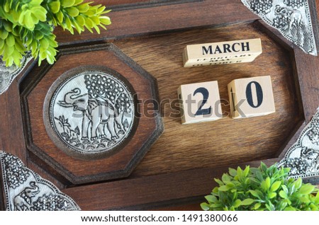 March month with elephant silver wooden design, Date 20.